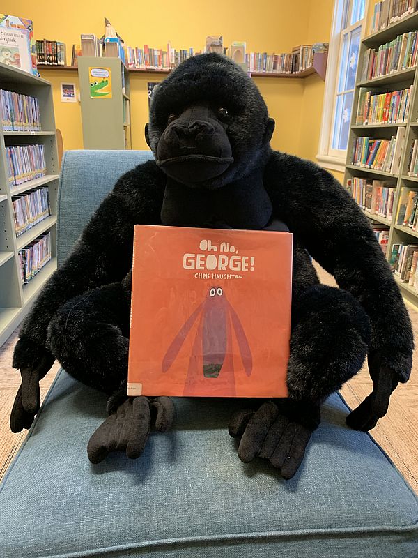 Photo of Gus with a book
