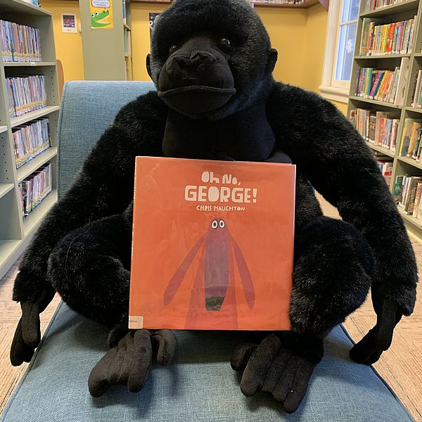Photo of Gus with a book